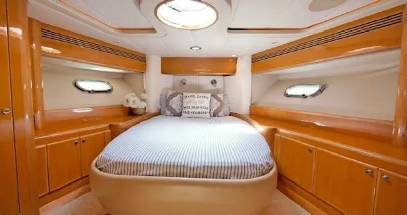 Slide: The Image of Luxurious 2004 McKinna Pilothouse bedroom with elegant wood finish and cozy bedding. - 25
