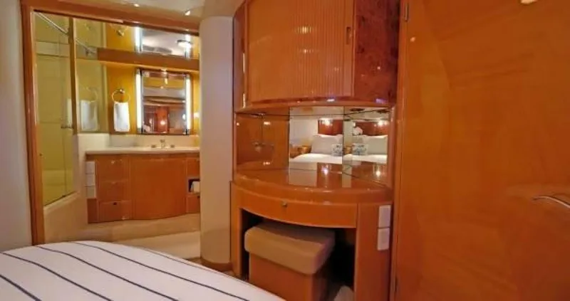 Slide: The Image of Luxurious 2004 McKinna Pilothouse interior with elegant wood finishes and modern amenities. - 28