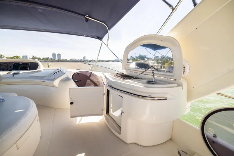 Slide: The Image of Luxurious 2005 Azimut 68 yacht interior with modern amenities and scenic water view. - 12