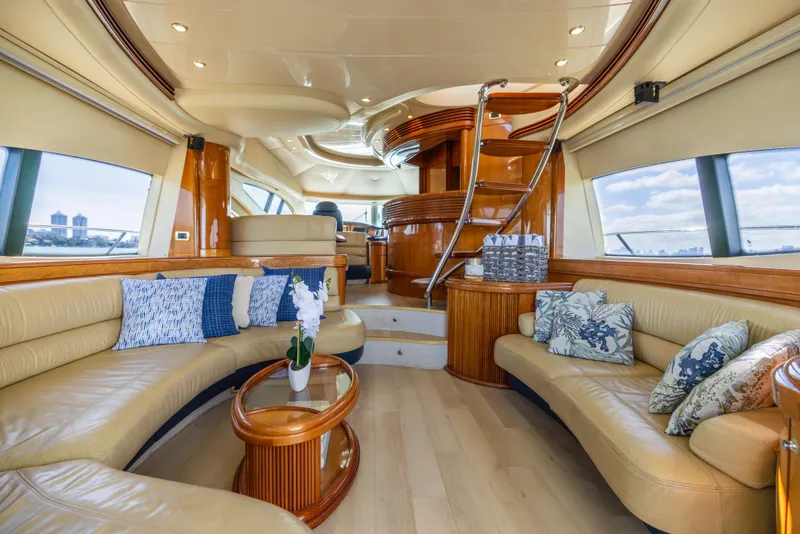 Slide: The Image of Luxurious interior of a 2005 Azimut 68 yacht with elegant seating and decor. - 18