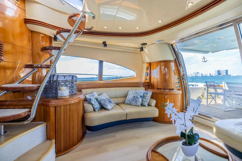 Slide: The Image of Luxurious interior of 2005 Azimut 68 yacht with elegant seating and scenic ocean view. - 19