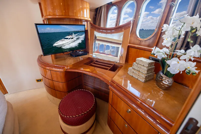 Slide: The Image of Luxurious interior of 2005 Azimut 68 yacht with elegant wood finish and modern amenities. - 25