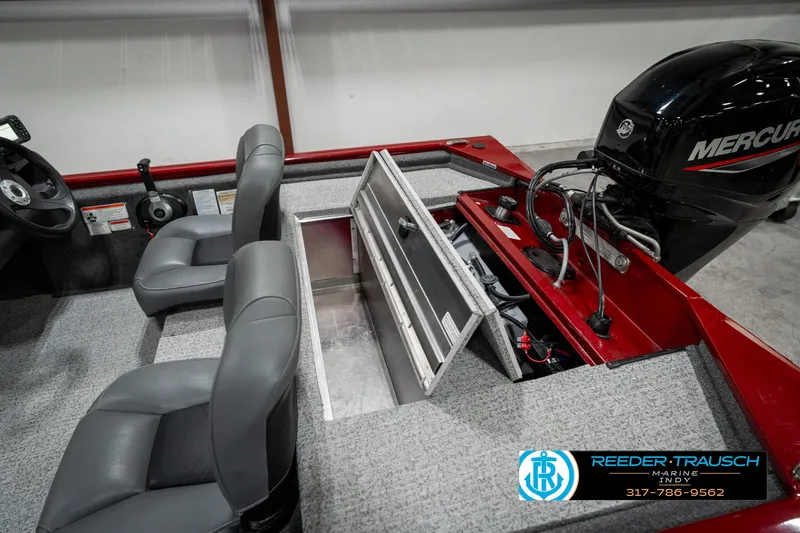 Slide: The Image of 2023 Tracker Pro 170 boat interior with Mercury engine and seating. - 24