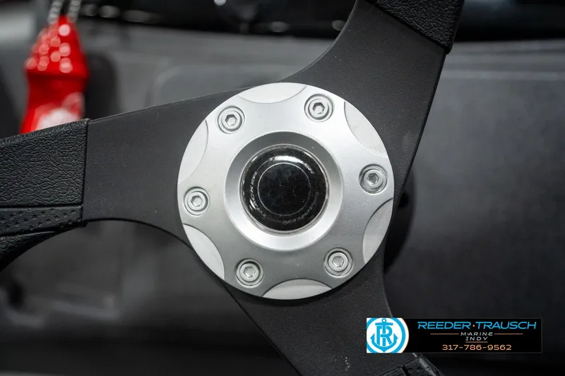 Slide: The Image of Close-up of 2023 Tracker Pro 170 steering wheel with metallic center. - 27