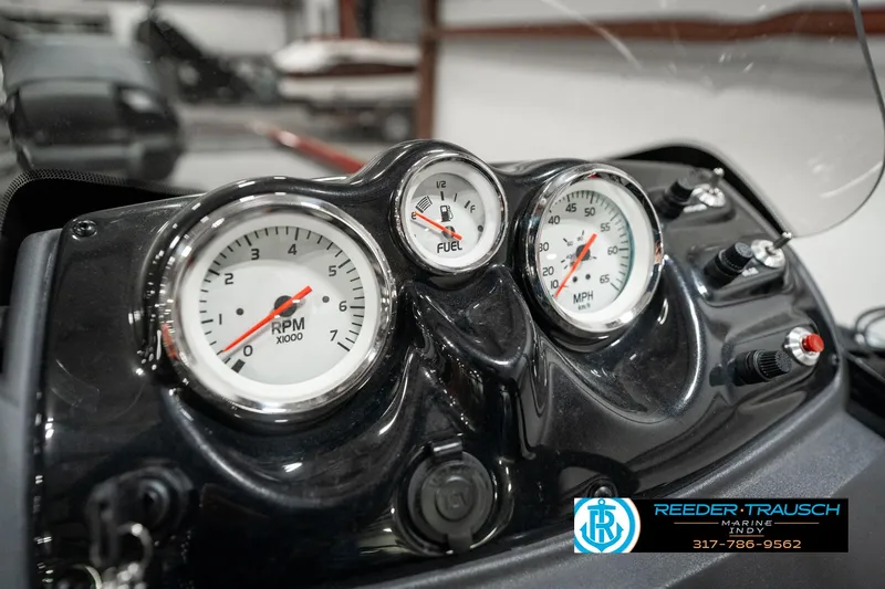 Slide: The Image of Dashboard of 2023 Tracker Pro 170 boat with RPM, fuel, and speed gauges. - 28
