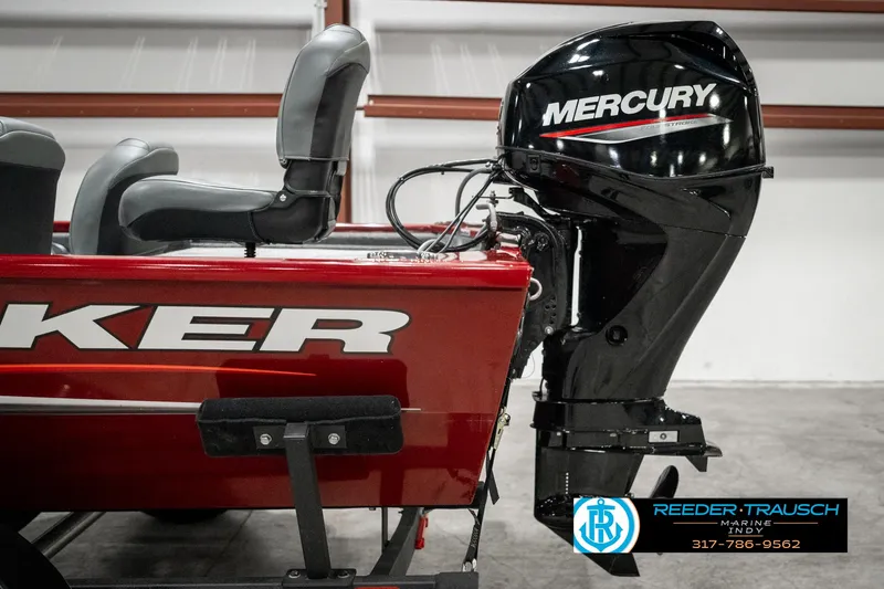 Slide: The Image of 2023 Tracker Pro 170 boat with Mercury outboard motor, red and black design. - 36