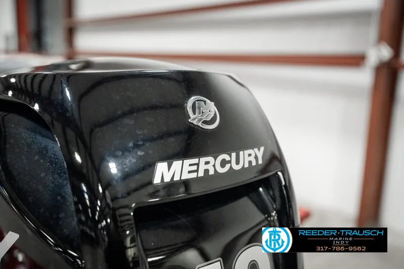 Slide: The Image of Mercury engine on 2023 Tracker Pro 170 boat in a showroom. - 38