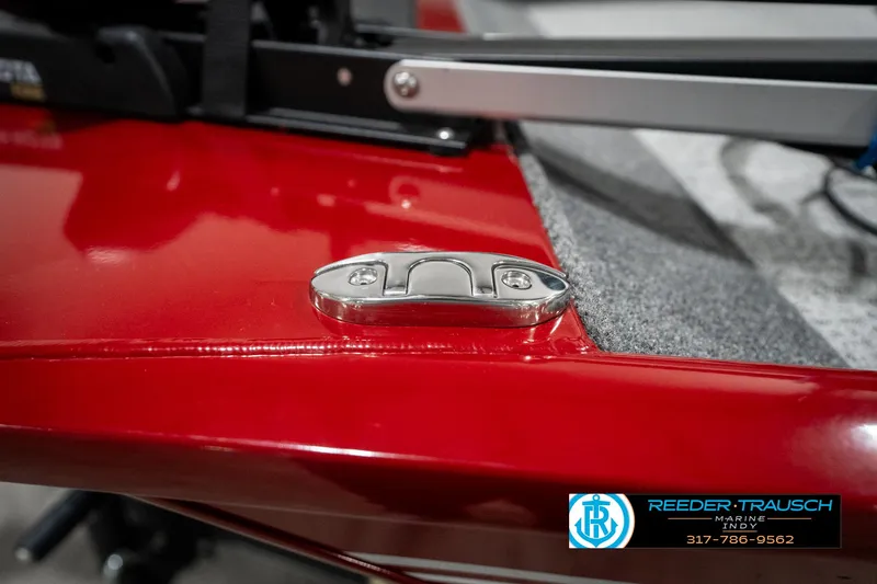 Slide: The Image of 2023 Tracker Pro 170 boat detail with red finish and metal hardware. - 44