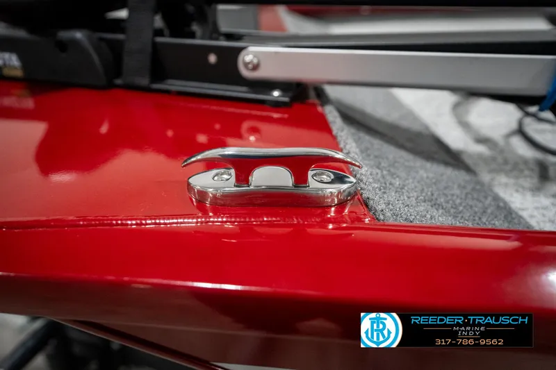 Slide: The Image of Red Tracker Pro 170 boat detail, 2023 model, featuring a metal cleat on the deck. - 45