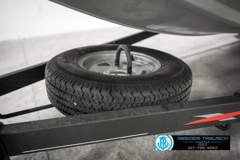 Slide: The Image of 2023 Tracker Pro 170 trailer with spare tire mounted underneath. - 46