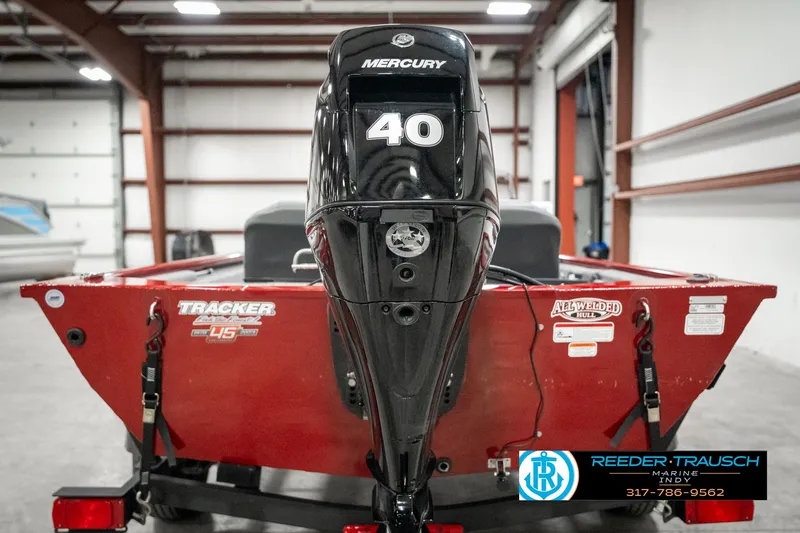Slide: The Image of 2023 Tracker Pro 170 boat with Mercury 40 engine in a warehouse. - 5