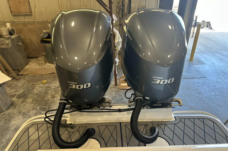 Slide: The Image of Twin Yamaha 300 outboard engines on a 2014 Concept 36 boat. - 24