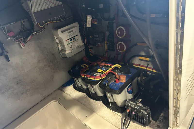 Slide: The Image of Electrical system of a 2014 Concept 36 boat, featuring batteries and wiring. - 29