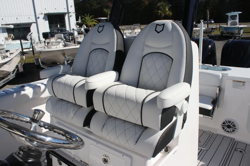 Slide: The Image of 2025 Sea Fox 288 Commander boat seats with elegant white upholstery. - 10