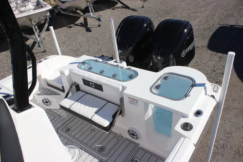 Slide: The Image of 2025 Sea Fox 288 Commander boat with dual Yamaha engines and spacious deck layout. - 13