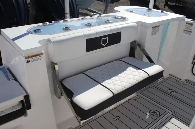 Slide: The Image of 2025 Sea Fox 288 Commander boat seating with quilted design and storage compartments. - 15