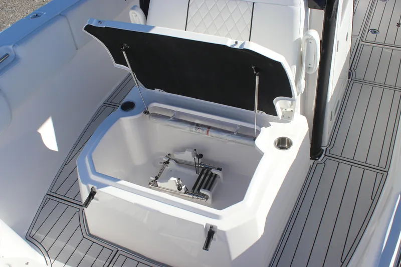 Slide: The Image of 2025 Sea Fox 288 Commander boat storage compartment with open lid. - 18