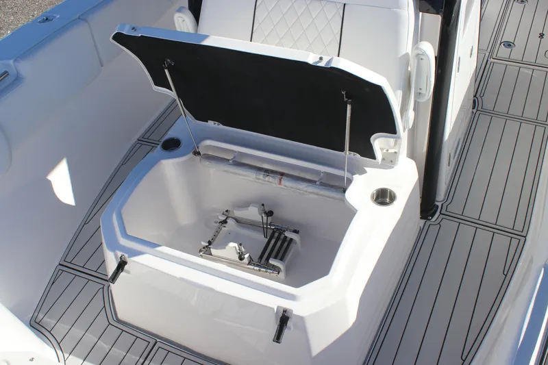 Slide: The Image of 2025 Sea Fox 288 Commander boat storage compartment with open lid. - 19
