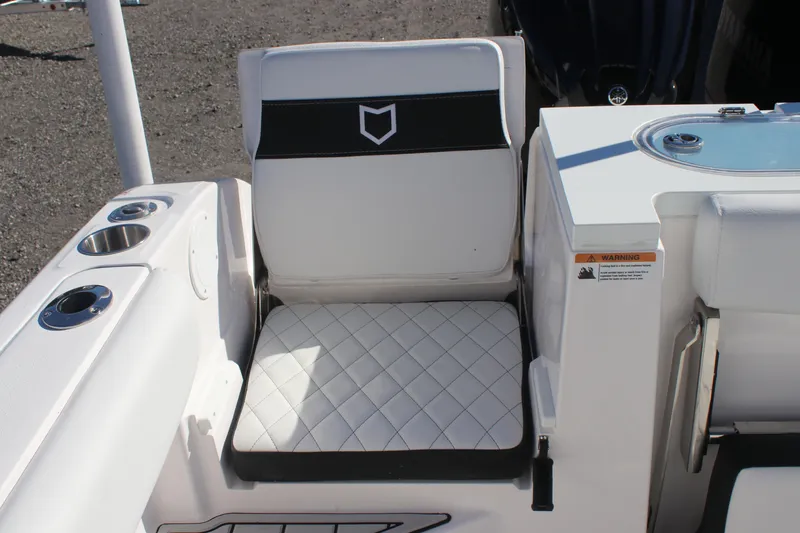 Slide: The Image of 2025 Sea Fox 288 Commander boat seat with quilted design and cup holders. - 20