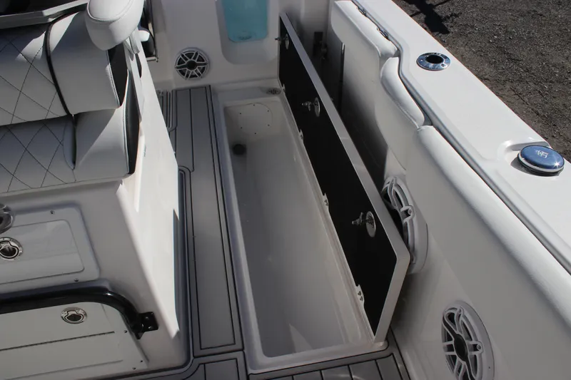 Slide: The Image of 2025 Sea Fox 288 Commander boat interior with open storage compartment. - 23