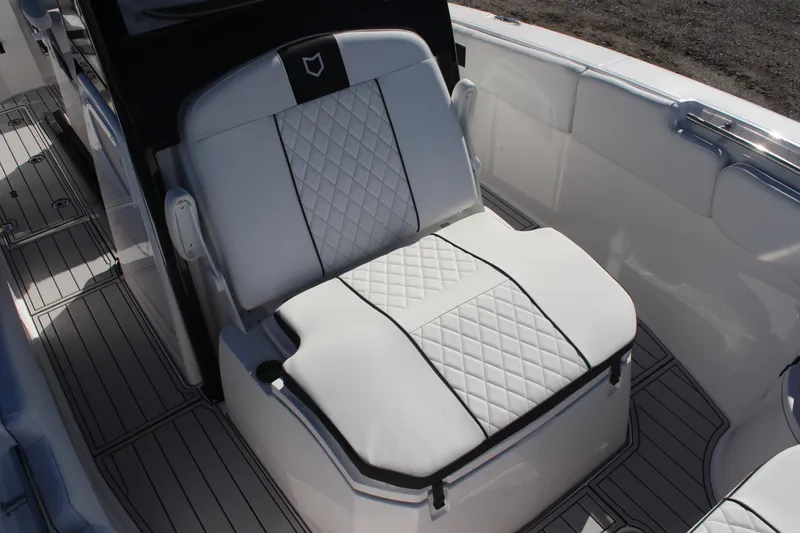 Slide: The Image of Luxurious seating on 2025 Sea Fox 288 Commander boat with quilted upholstery. - 24
