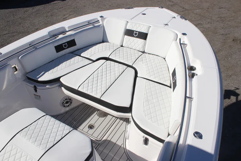 Slide: The Image of 2025 Sea Fox 288 Commander boat with luxurious white seating and diamond stitching. - 25