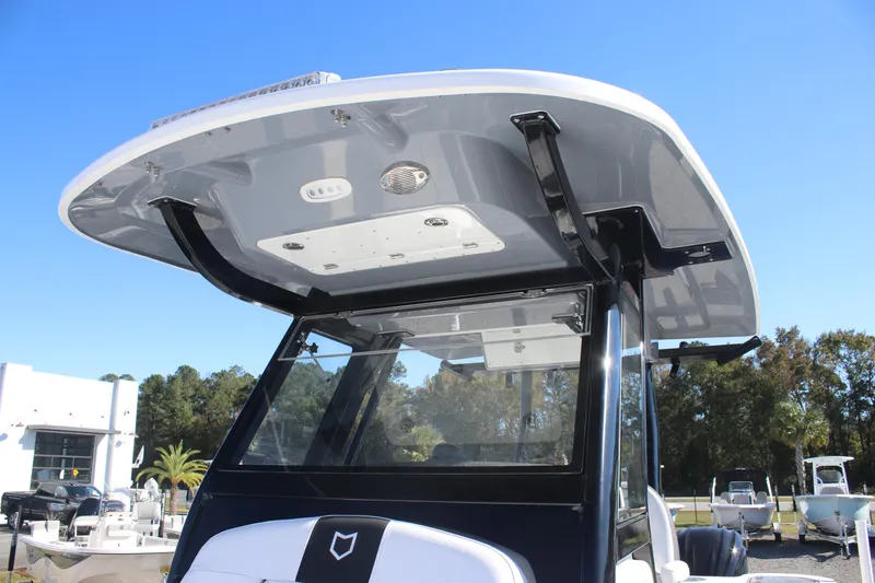 Slide: The Image of 2025 Sea Fox 288 Commander boat with sleek hardtop and modern design. - 26