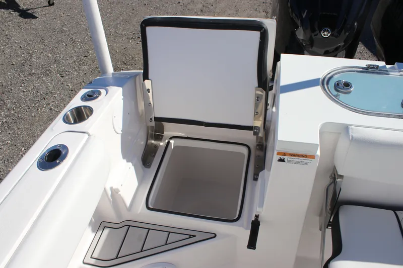 Slide: The Image of 2025 Sea Fox 288 Commander boat storage compartment and seating area. - 30
