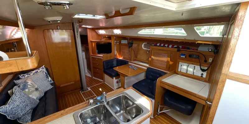Slide: The Image of Interior of 2005 Catalina 350 MkII sailboat with wood finish and modern amenities. - 17