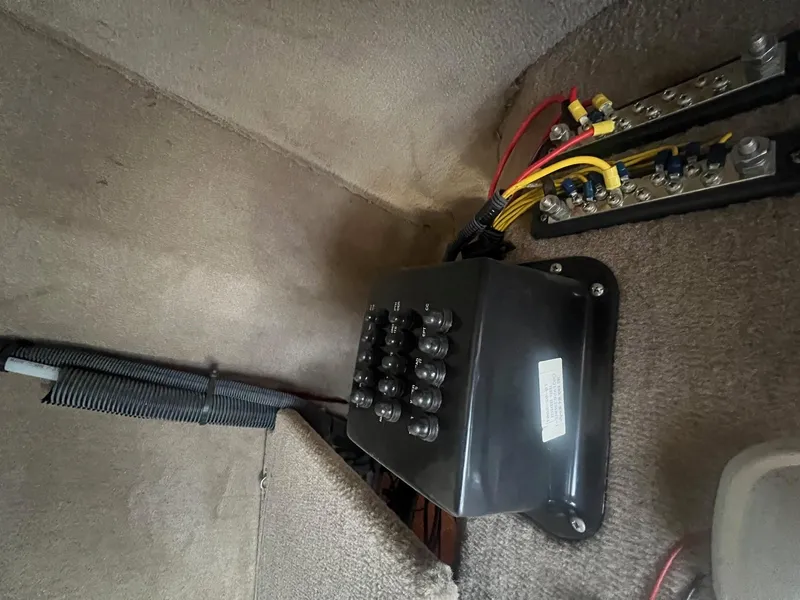 Slide: The Image of Electrical panel and wiring inside a 2002 Chaparral Sunesta 243 boat. - 16
