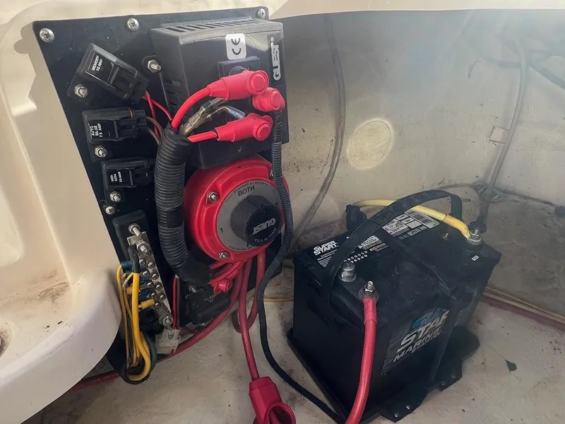 Slide: The Image of Battery and electrical panel in 2002 Chaparral Sunesta 243 boat. - 26