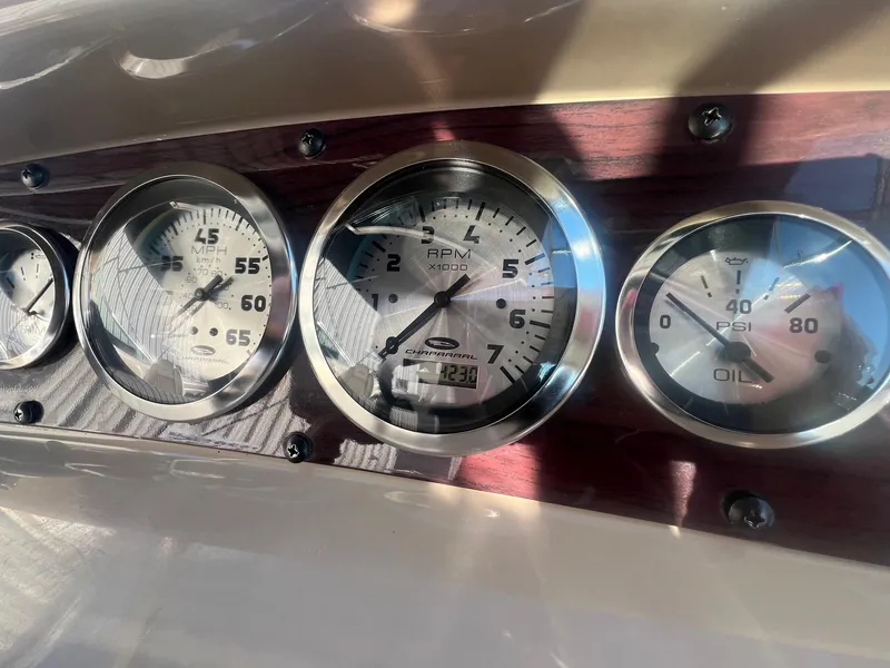 Slide: The Image of Dashboard gauges of a 2002 Chaparral Sunesta 243 boat. - 29
