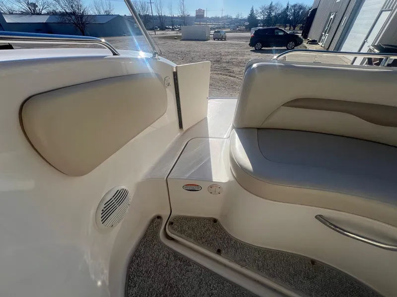 Slide: The Image of Interior view of 2002 Chaparral Sunesta 243 boat with seating and speaker. - 35