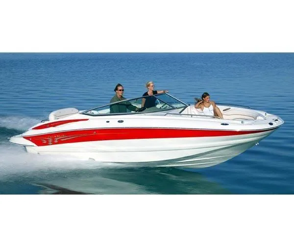 The Image of 2010 Crownline 195SS boat cruising on calm blue water. - 0