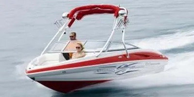 Slide: The Image of 2010 Crownline 195SS speedboat cruising on open water. - 1
