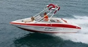 Slide: The Image of 2010 Crownline 195SS speedboat cruising on open water. - 3