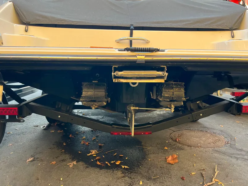 Slide: The Image of Rear view of a 2020 Yamaha AR240 boat on a trailer. - 3