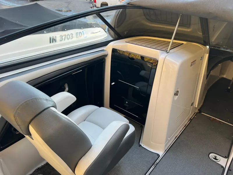 Slide: The Image of 2020 Yamaha AR240 boat interior with seating and storage area. - 5