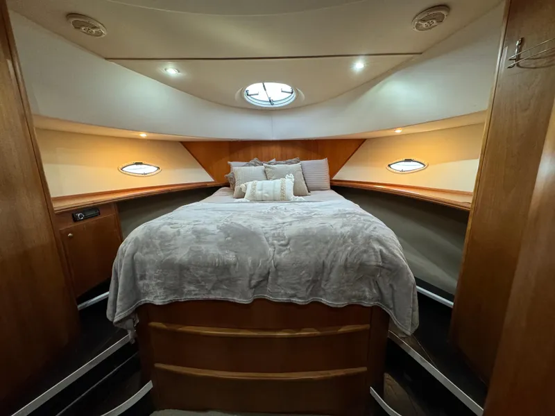 Slide: The Image of Luxurious bedroom interior of 2001 Silverton 410 Sport Bridge yacht. - 13