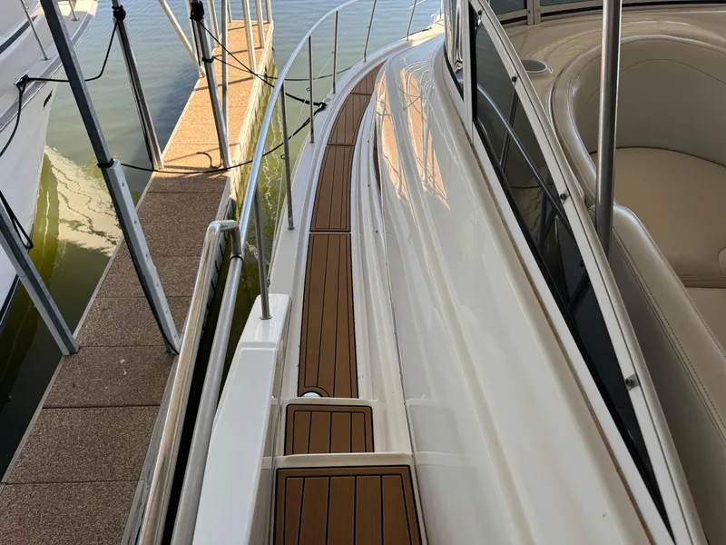 Slide: The Image of 2001 Silverton 410 Sport Bridge yacht with sleek deck design and comfortable seating. - 41