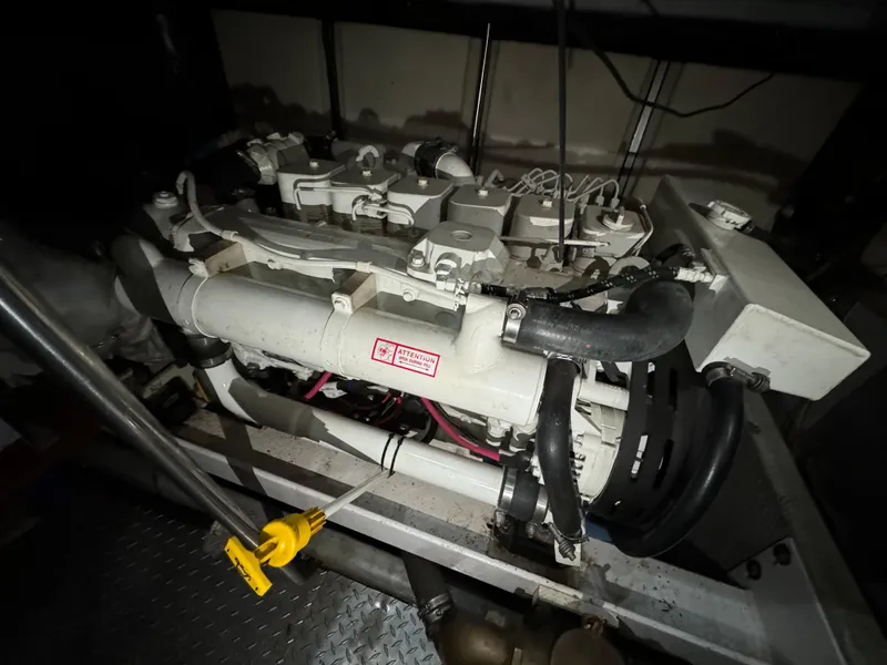 Slide: The Image of Engine of 2001 Silverton 410 Sport Bridge yacht in engine room. - 48