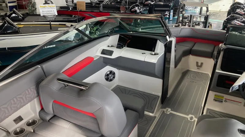 Slide: The Image of 2025 Regal LS4 boat interior with modern seating and sleek design. - 9