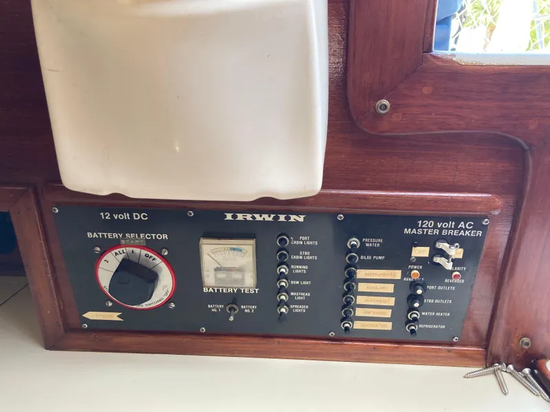 Slide: The Image of Control panel of 1984 Irwin 34 Sloop with battery selector and master breaker. - 8