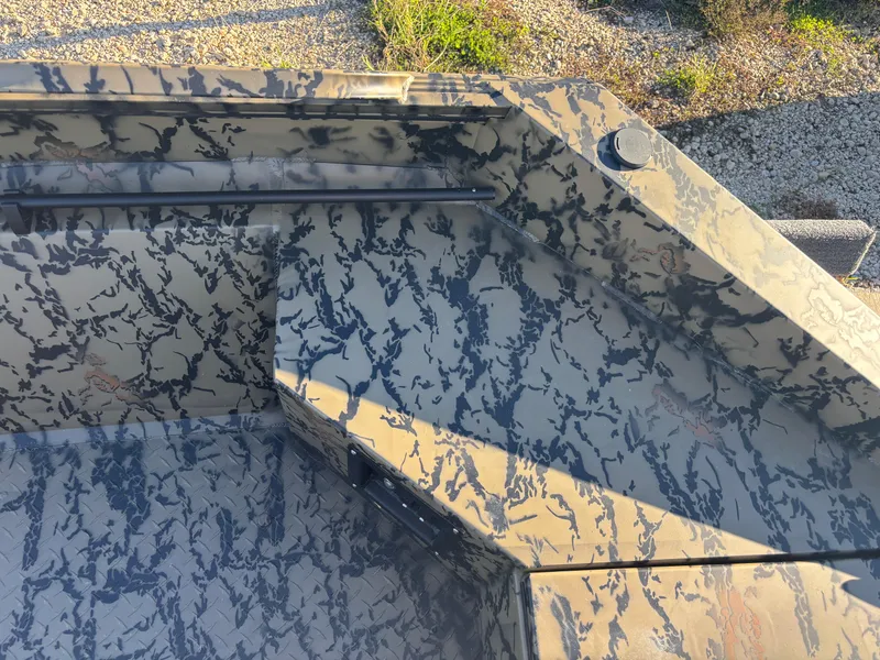 Slide: The Image of 2025 Edge Duck Boats 556 DB with camouflage interior design. - 11