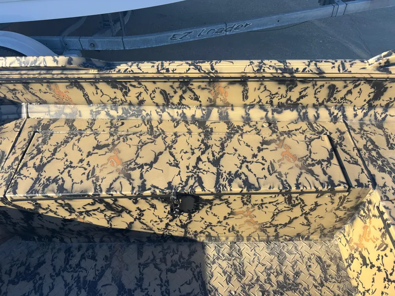 Slide: The Image of 2025 Edge Duck Boats 556 DB with camouflage interior design. - 6