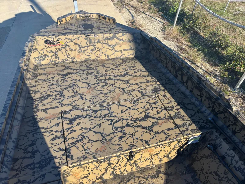 Slide: The Image of 2025 Edge Duck Boats 556 DB with camouflage pattern on deck. - 8