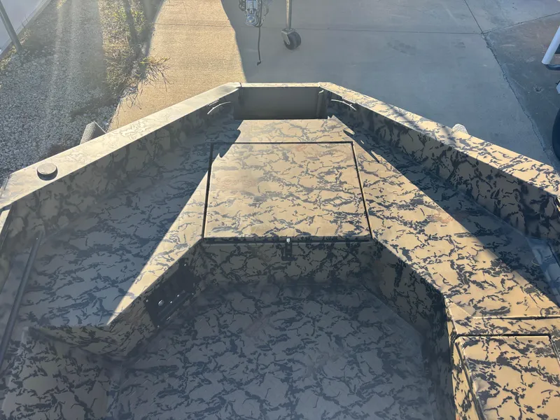 Slide: The Image of 2025 Edge Duck Boats 556 DB with camouflage pattern, viewed from above. - 4