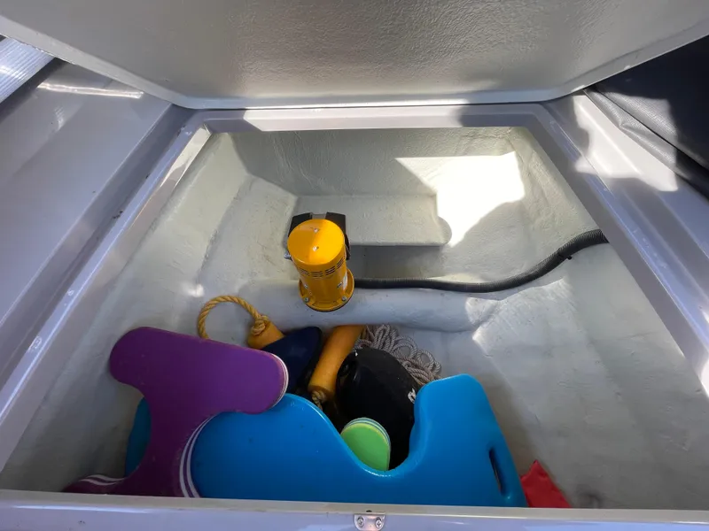 Slide: The Image of Storage compartment of 2023 Skipper-BSK 38NC boat with various equipment. - 16
