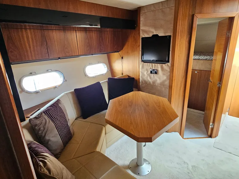 Slide: The Image of Luxurious interior of 2010 Sunseeker Predator 64 yacht with cozy seating and modern decor. - 12