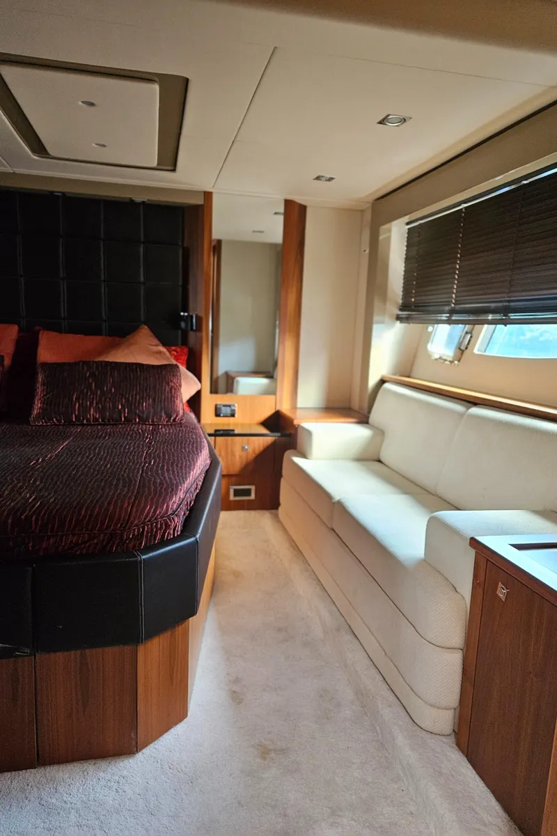 Slide: The Image of Luxurious interior of 2010 Sunseeker Predator 64 yacht with elegant furnishings. - 21